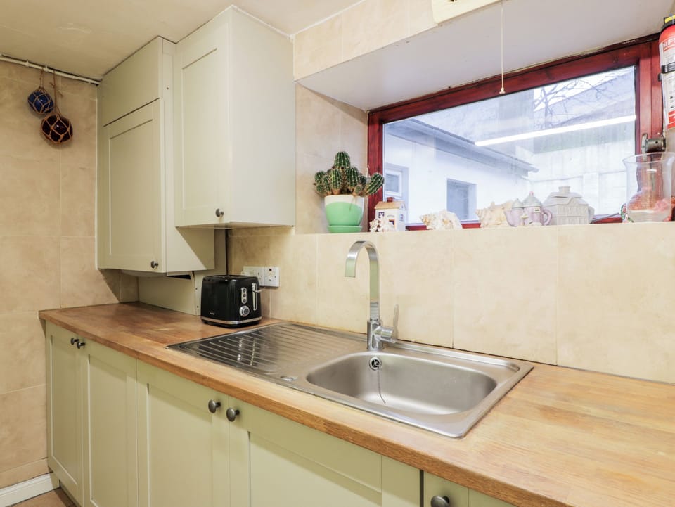 Fridge, microwave, highchair, cookware/dishes/utensils