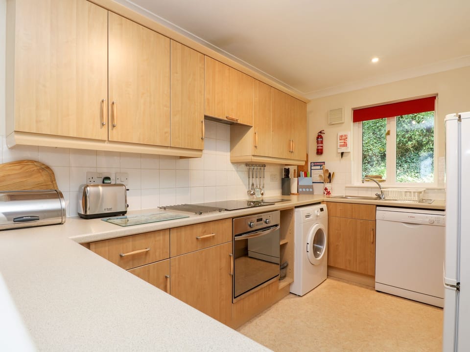 Cottage | Private kitchen | Stovetop, dishwasher, highchair, cookware/dishes/utensils