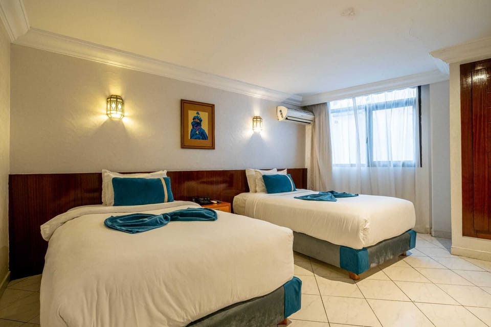 Twin Room | Minibar, desk, soundproofing, free WiFi