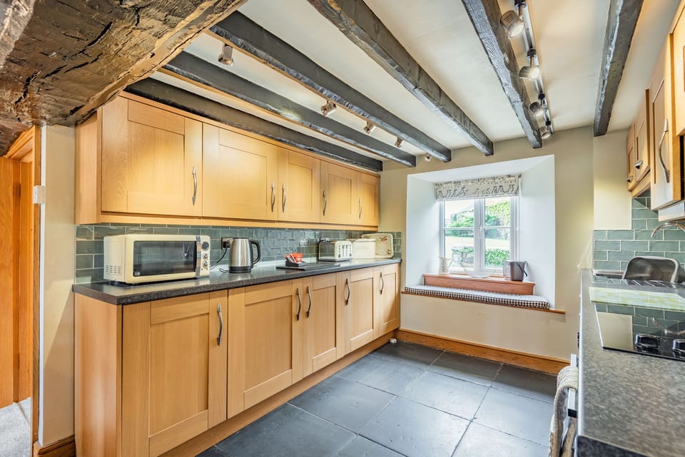 Cottage | Private kitchen | Dishwasher, highchair, cookware/dishes/utensils