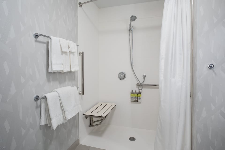 Suite, 1 King Bed, Accessible (Mobility Roll-In Shower) | In-room safe, desk, laptop workspace, blackout drapes