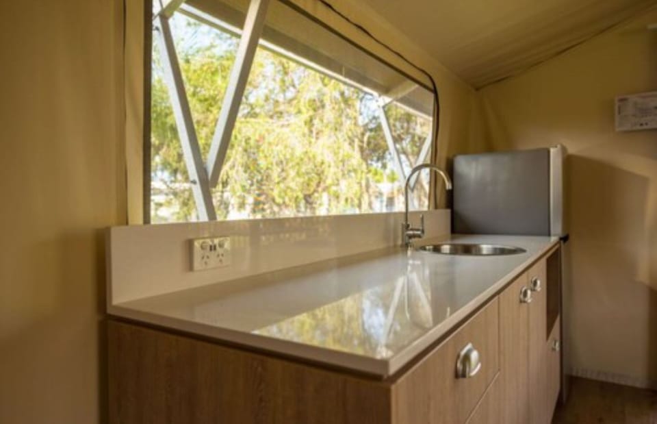 Deluxe Safari Tent | Private kitchen | Fridge, stovetop, electric kettle, cookware/dishes/utensils