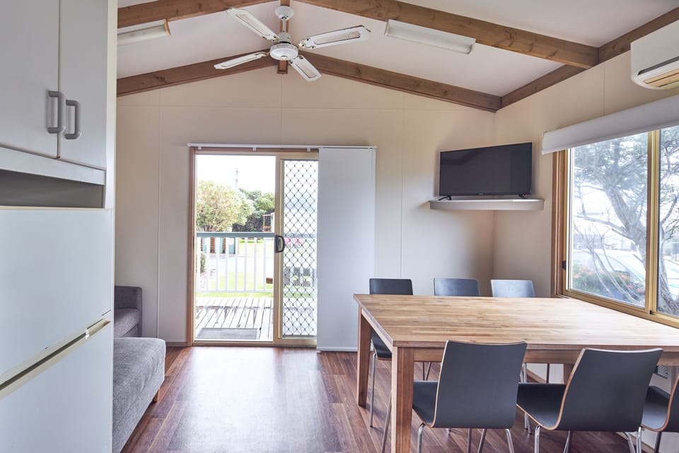 Holiday Unit | Living area | 42-inch flat-screen TV with satellite channels