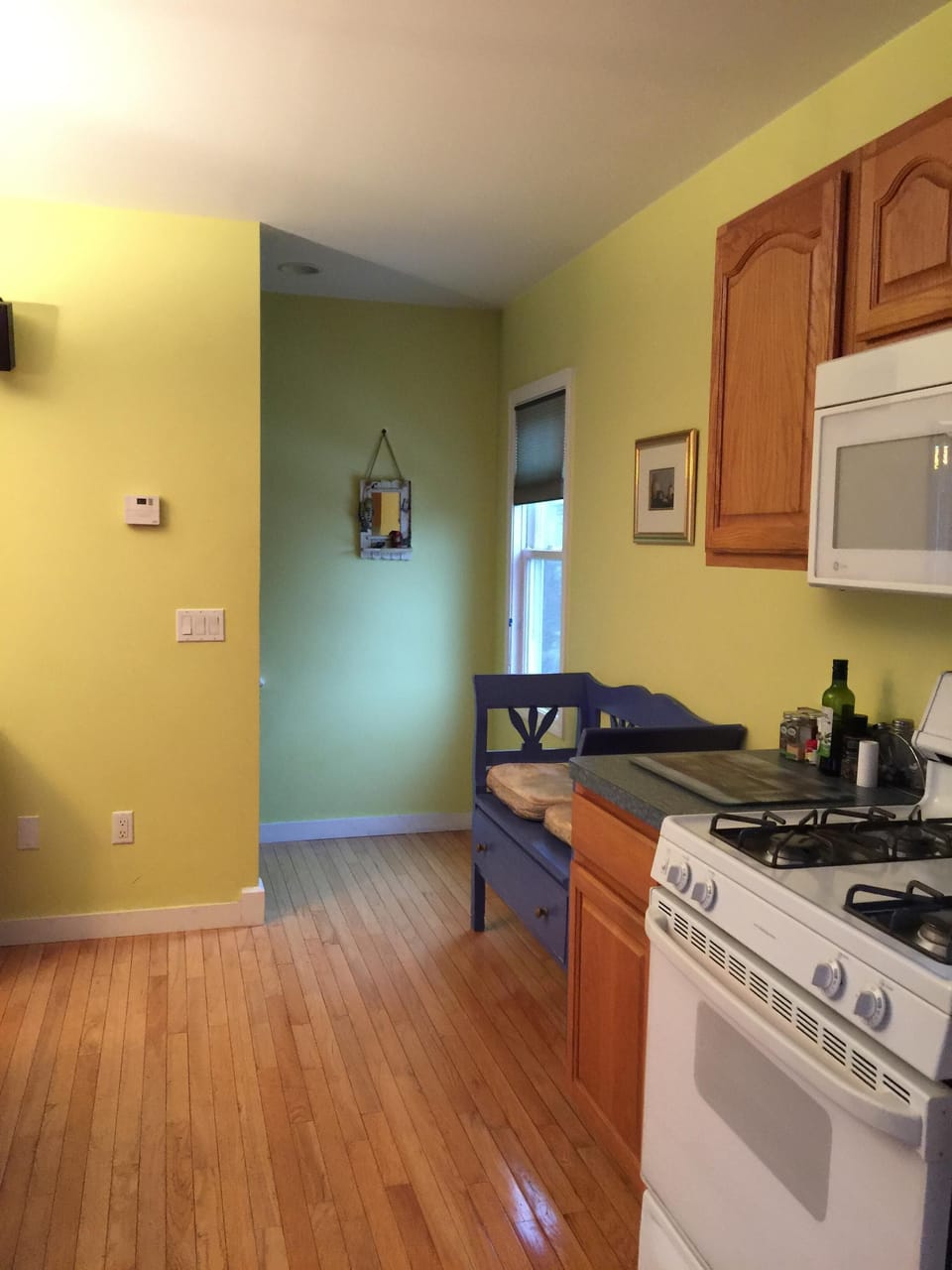 From the kitchen area you get to the stairs that lead to second & third floors.