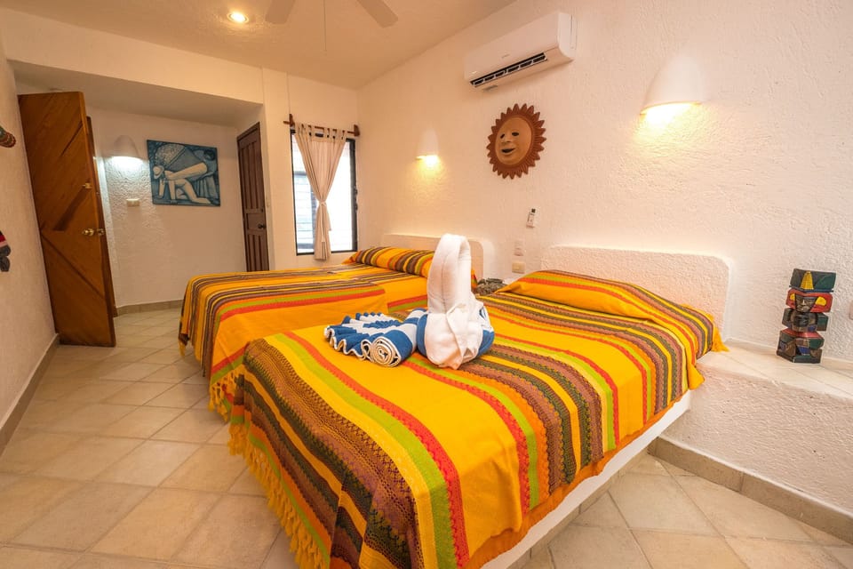 Double and Twin Bed - Second guest bedroom  Luna Azul condo 1 Half Moon Bay beach Akumal Mexico 2 bedroom vacation rental