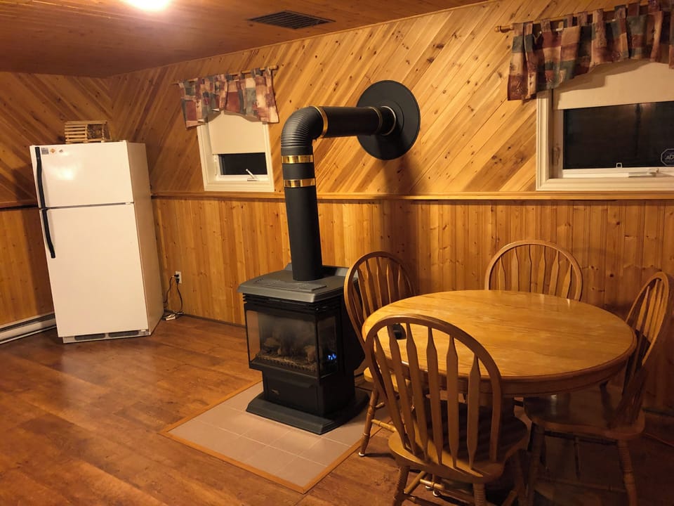 A second fridge in the lower level and table for cards or laughs.