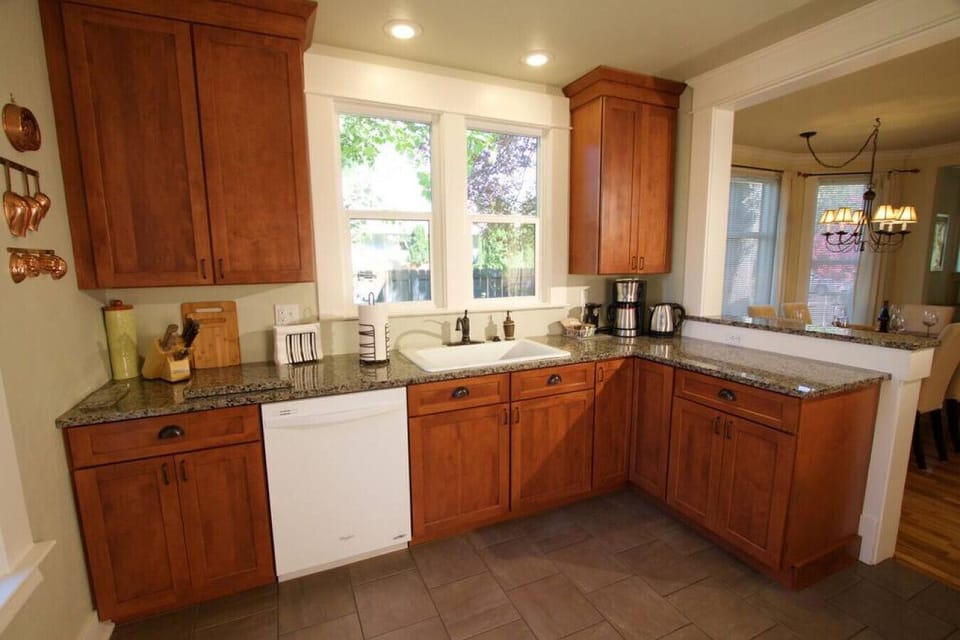 Kitchen with dishwasher and drip coffee maker