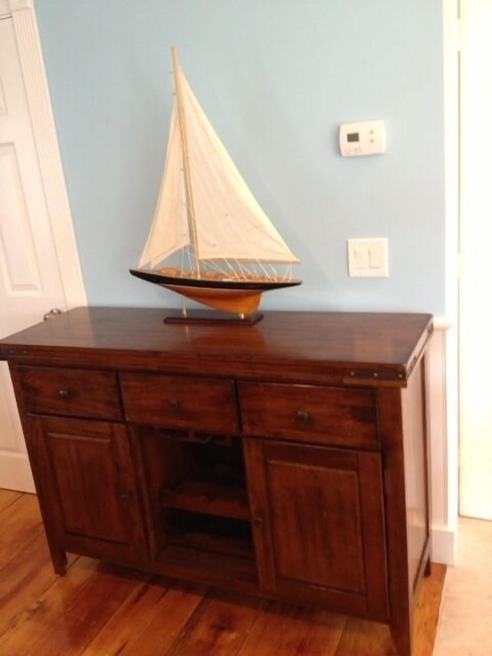 Living room server/wine bar.  Extra wide pumpkin pine wood floors from 1800s