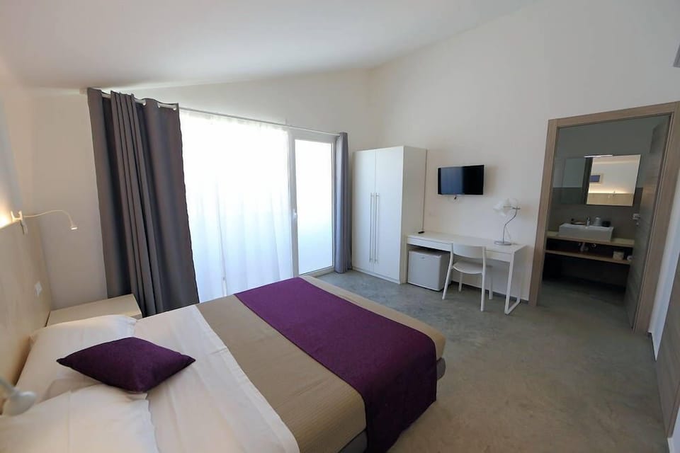 Double Room | Premium bedding, down comforters, memory foam beds, desk