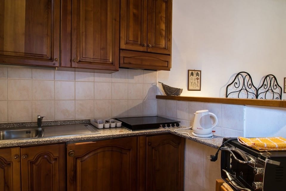 Standard Apartment (Talamo) | Private kitchen | Full-size fridge, oven, stovetop, cookware/dishes/utensils