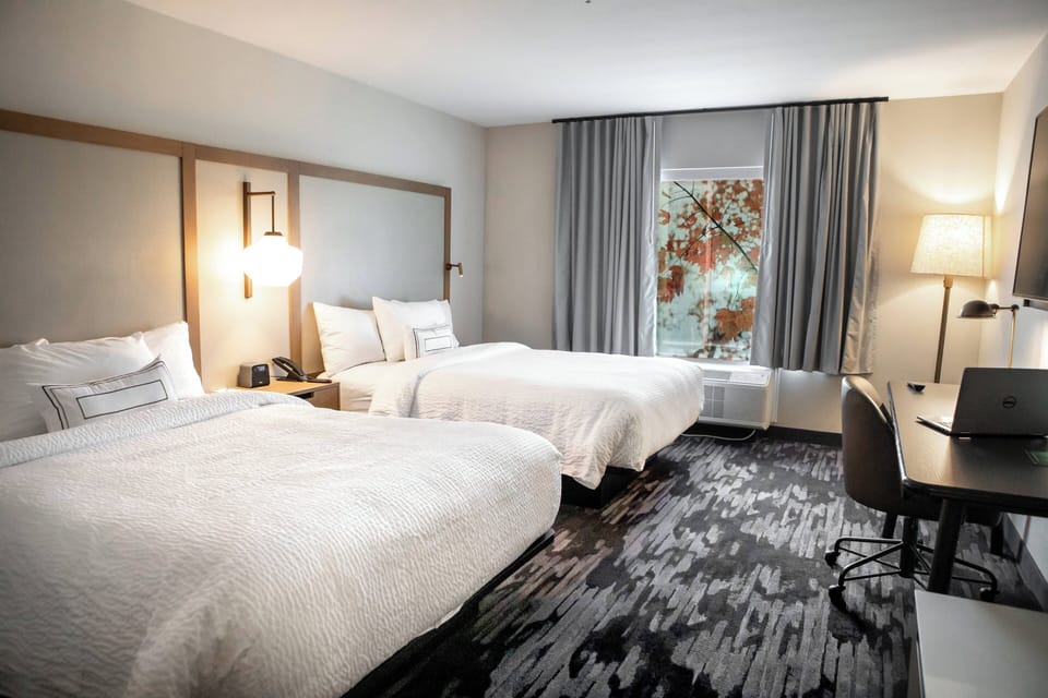 Premium bedding, down comforters, pillowtop beds, desk