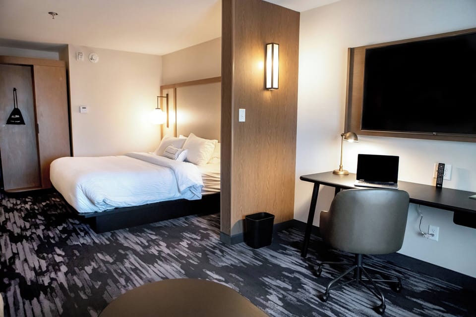 Premium bedding, down comforters, pillowtop beds, desk