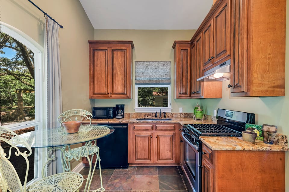 Full size kitchen; includes oven/stove and under the counter refrigerator 