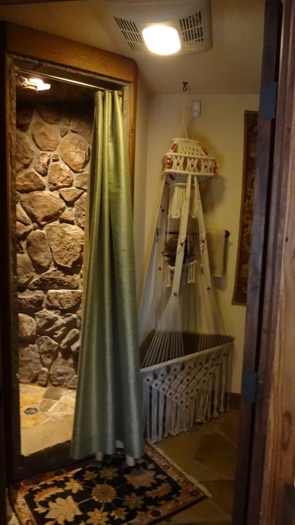 Loft bathroom (Hanging table is from the Philippines). 