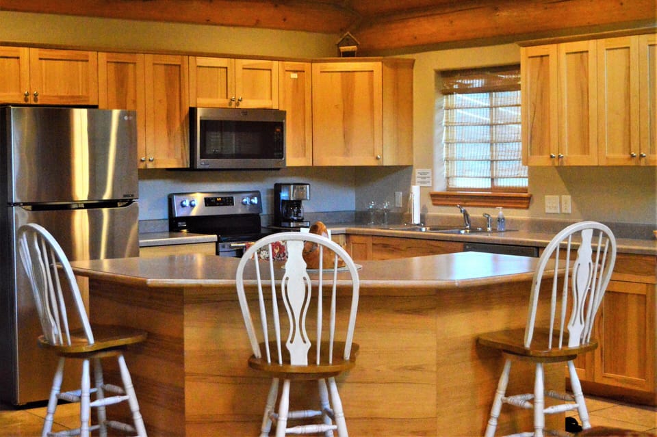 The kitchen island will seat five.