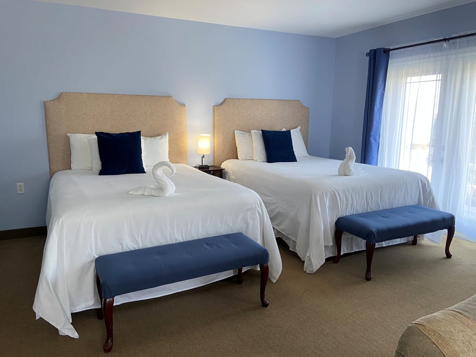 Suite, 2 Queen Beds, Non Smoking | Blackout drapes, soundproofing, iron/ironing board, free WiFi