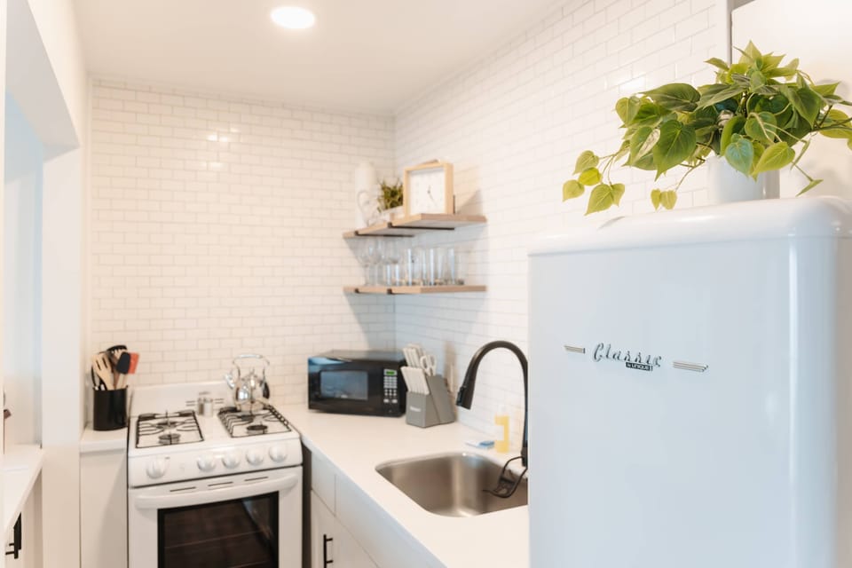 Fully stocked kitchen with everything you need to cook, snack, or sip.
