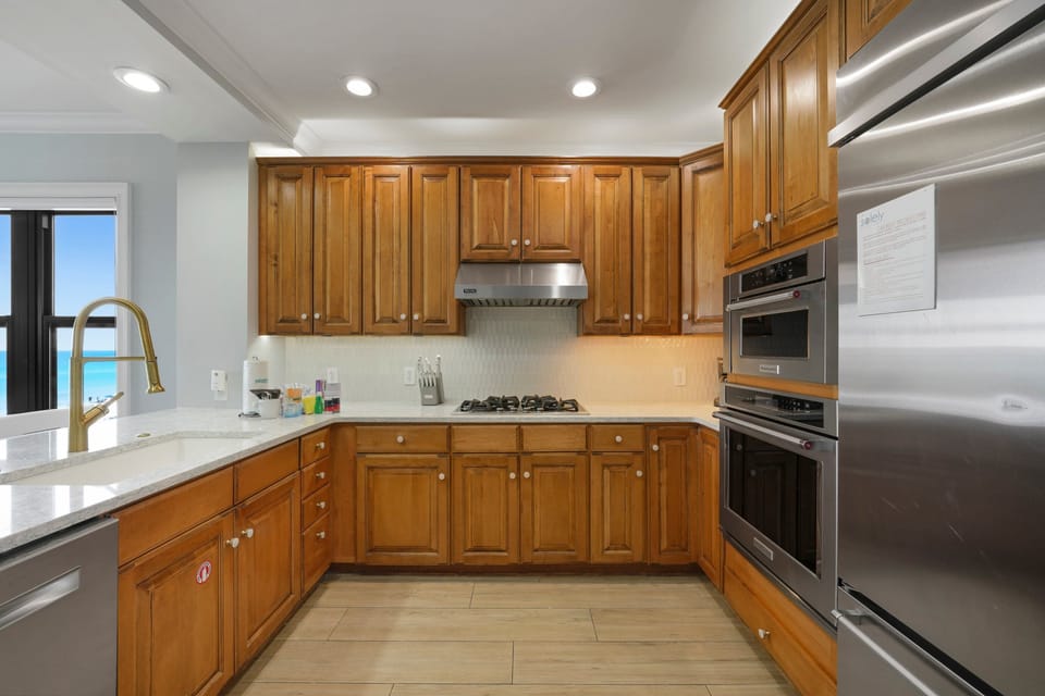 Full kitchen with stainless steel appliances
