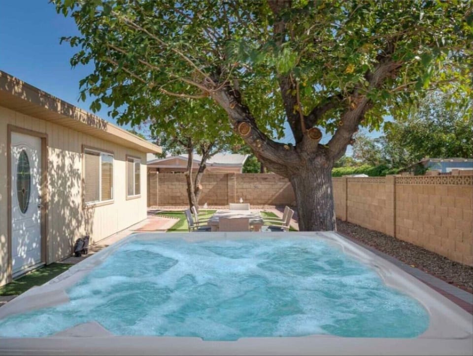 Soak in the NEW hot tub after a day shopping or golfing