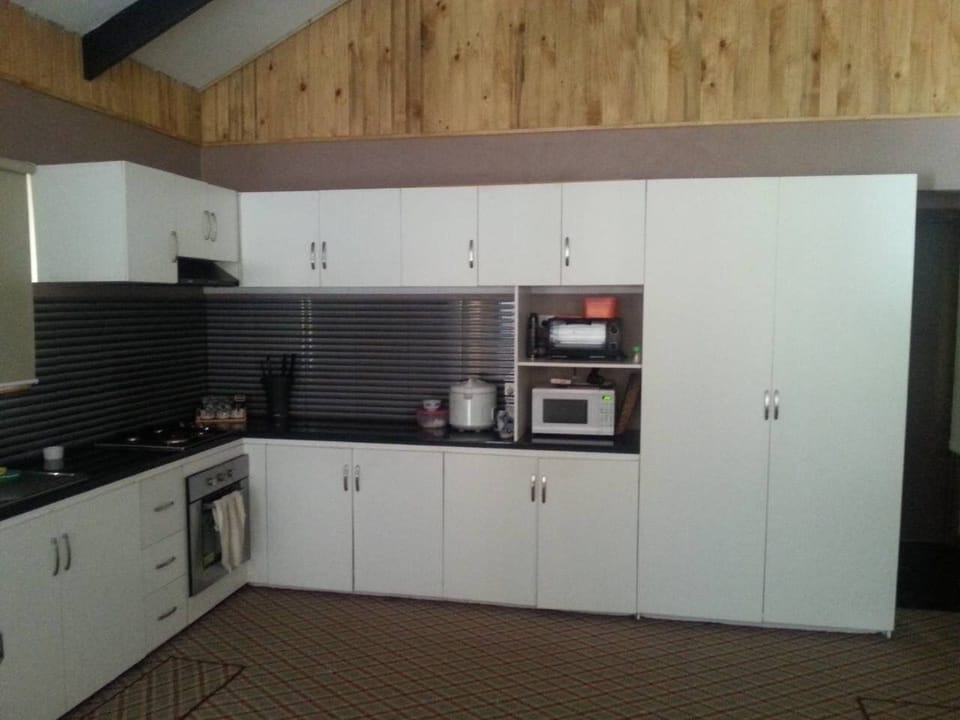 Deluxe Villa | Private kitchen | Full-size fridge, microwave, oven, stovetop