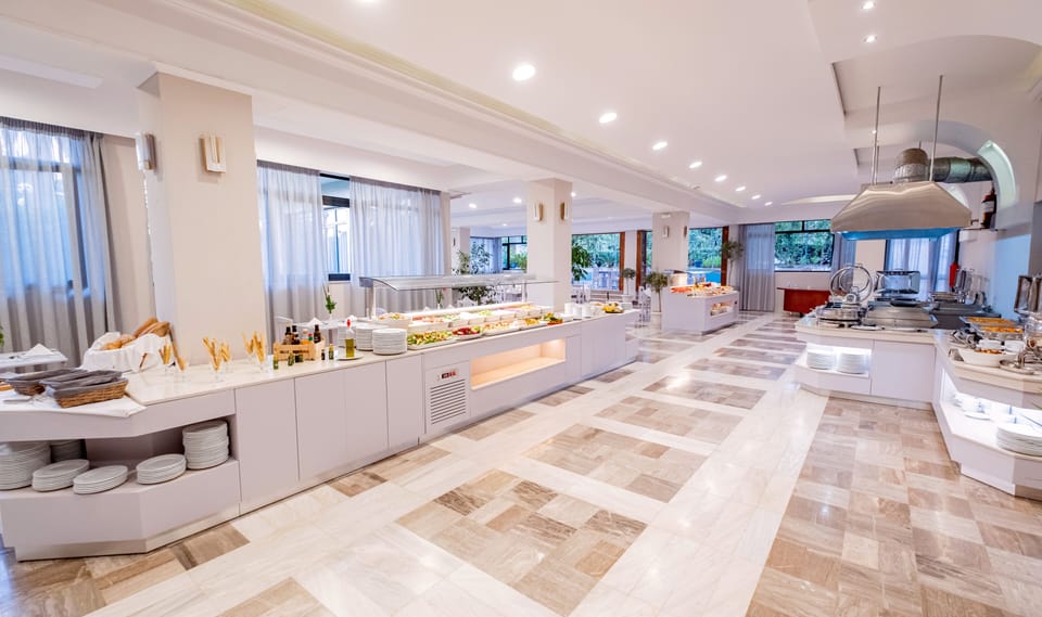 2 restaurants, breakfast, lunch, dinner served; Greek cuisine