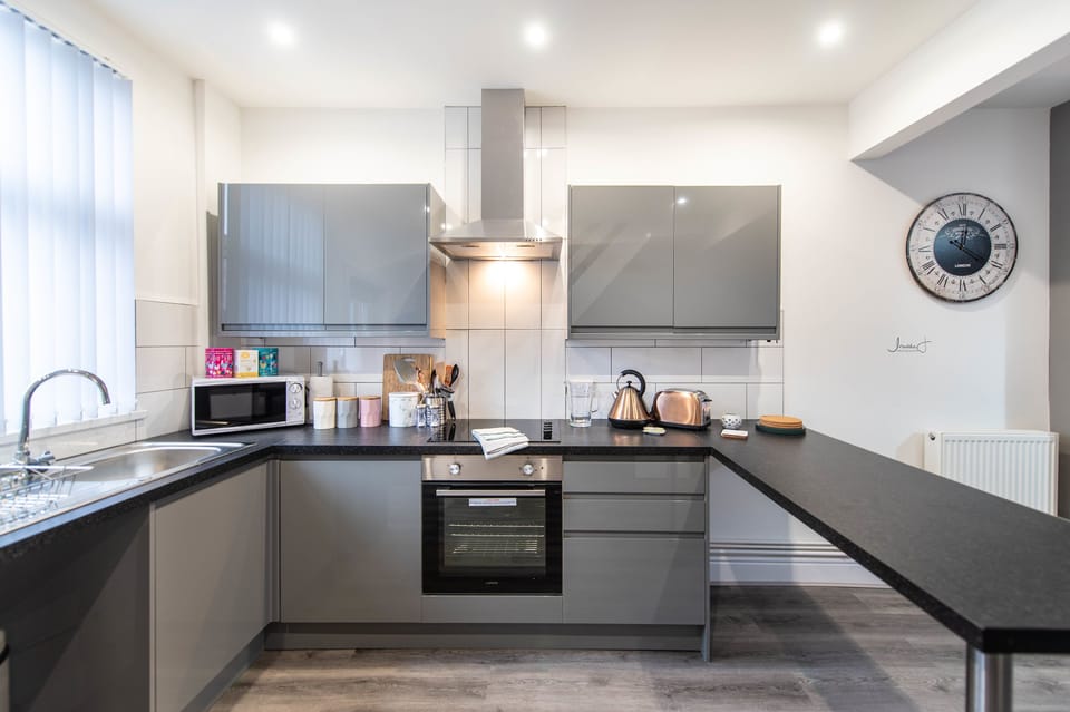 Premium Townhome, Multiple Beds, Non Smoking | Private kitchen | Full-size fridge, microwave, oven, stovetop