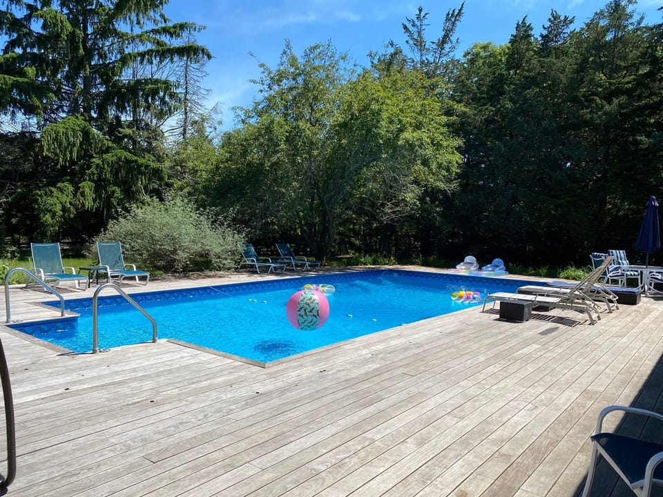 heated in deck pool, plenty of floats and pool toys