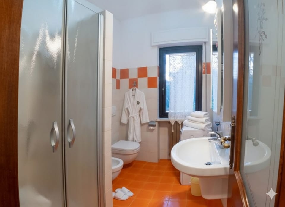 Apartment, 2 Bedrooms, Terrace | Bathroom | Shower, rainfall showerhead, bidet, towels