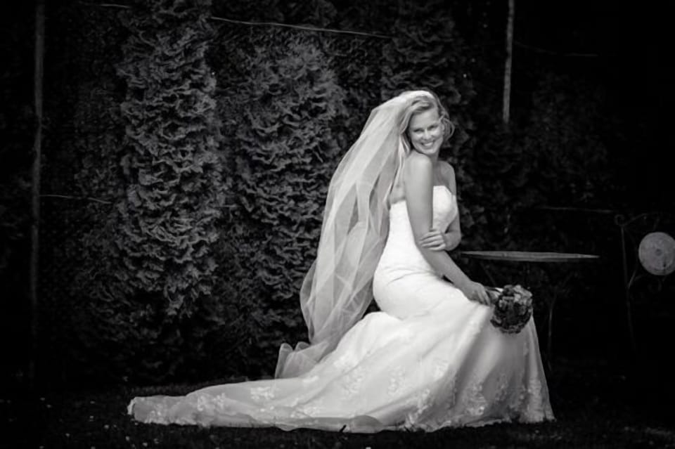 Bride by tennis court