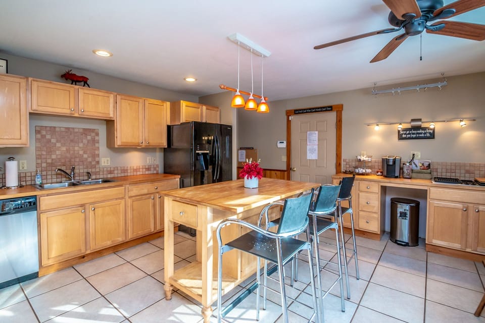 Butcher block kitchen with 2 cook tops
