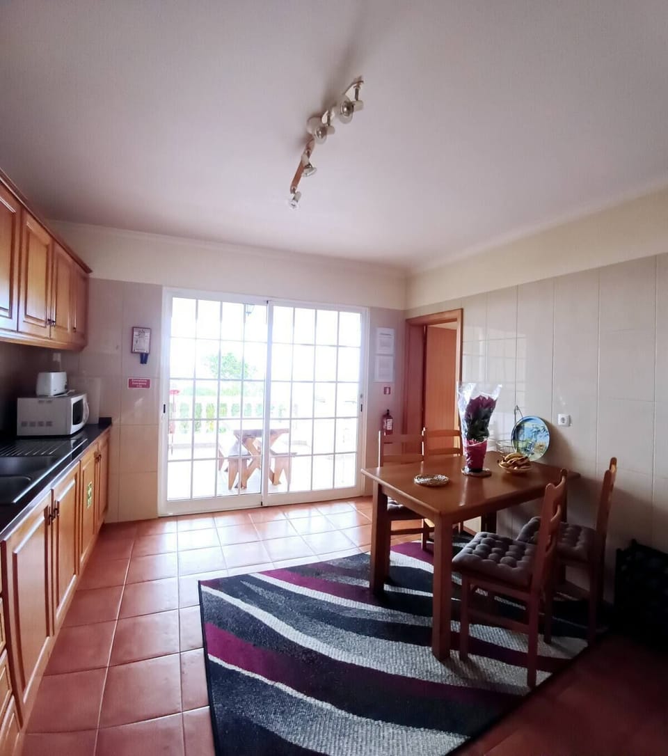 French doors lead onto Bbq area - lots of natural light