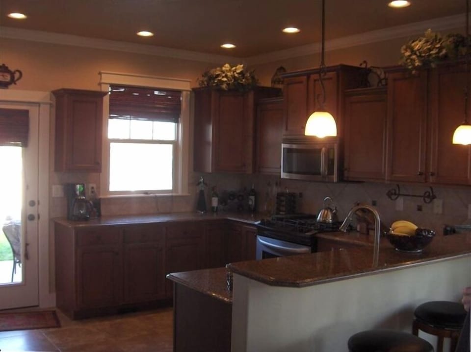 View ~ Custom Kitchen with Slab Granite