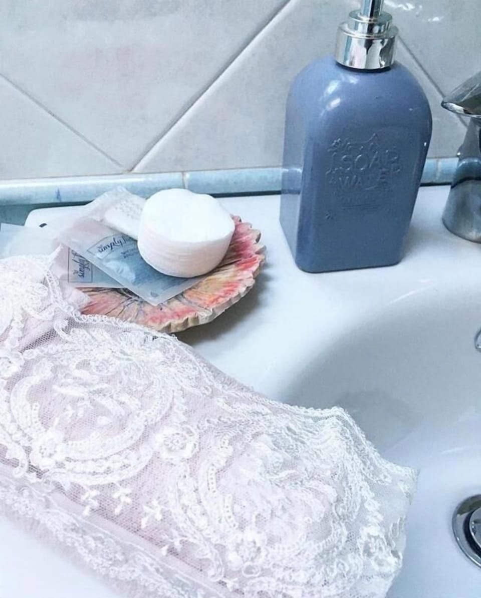 Shower, rainfall showerhead, bidet, towels