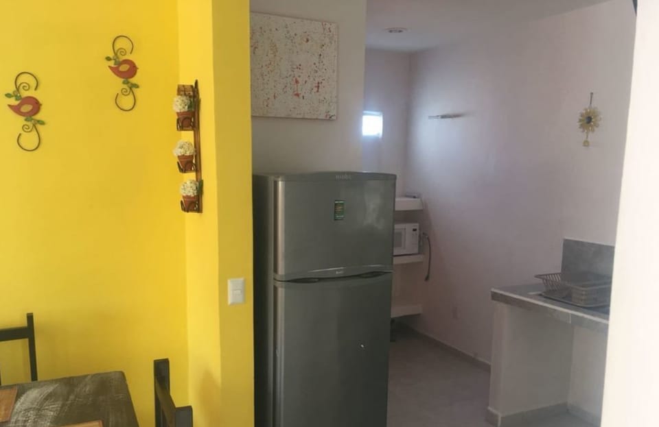 Family Apartment, Multiple Beds, Non Smoking | Private kitchen | Full-size fridge, microwave, stovetop, coffee/tea maker
