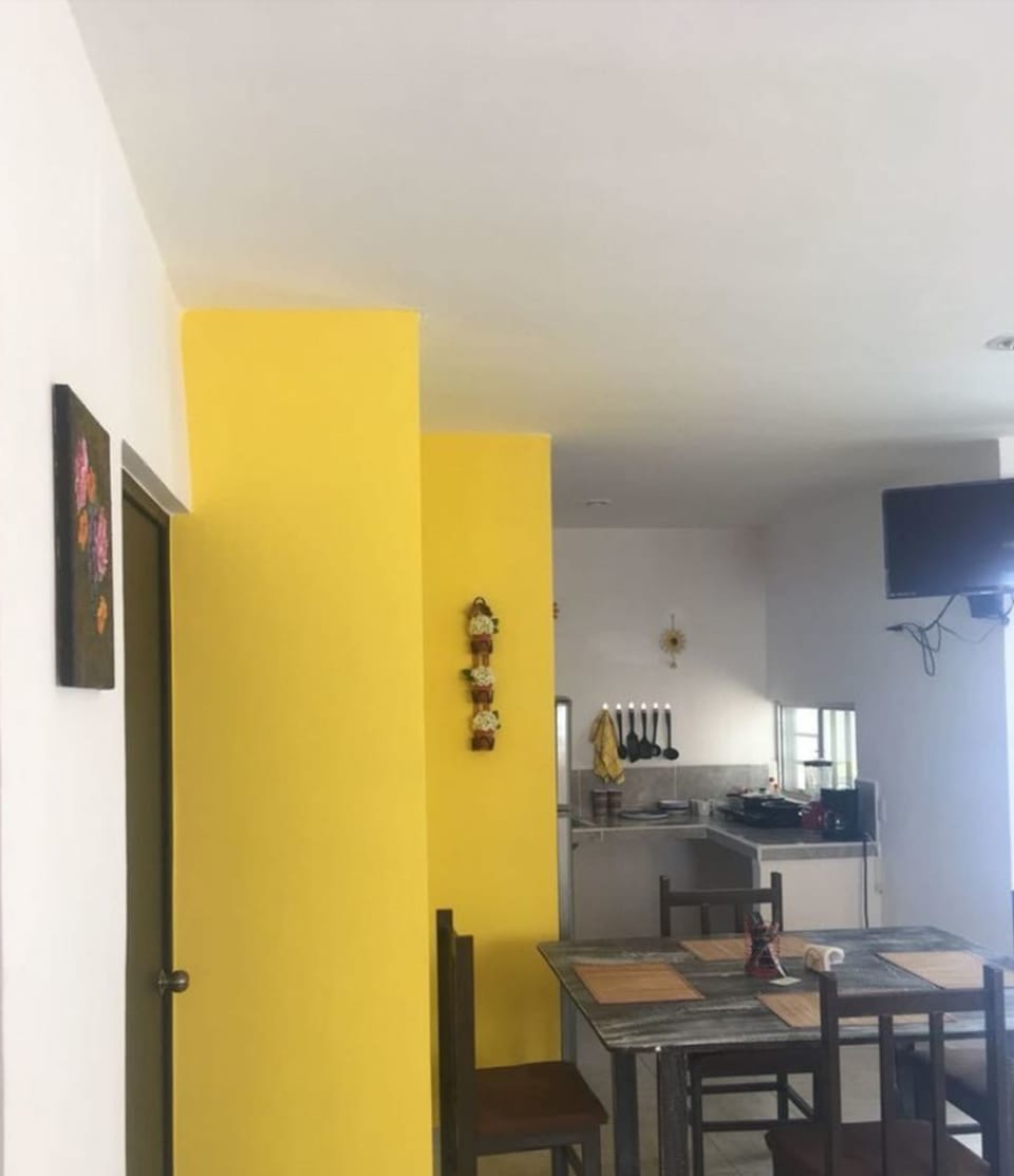 Family Apartment, Multiple Beds, Non Smoking | Private kitchen | Full-size fridge, microwave, stovetop, coffee/tea maker
