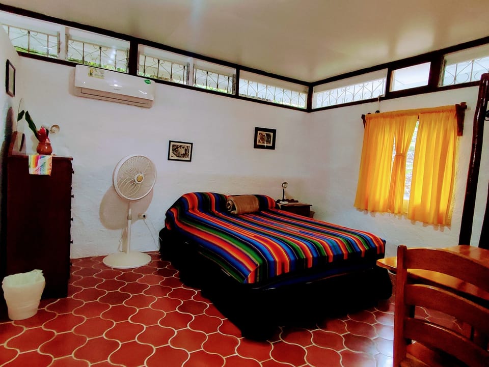 Standard Bungalow, 1 Queen Bed, Pool Access, Garden View | Memory foam beds, individually furnished, iron/ironing board, free WiFi