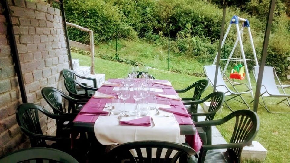 Outdoor furniture for dining in the fenced yard