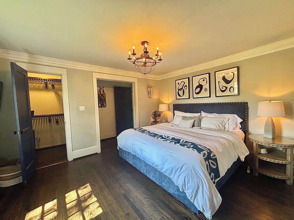 Primary bedroom king size bed