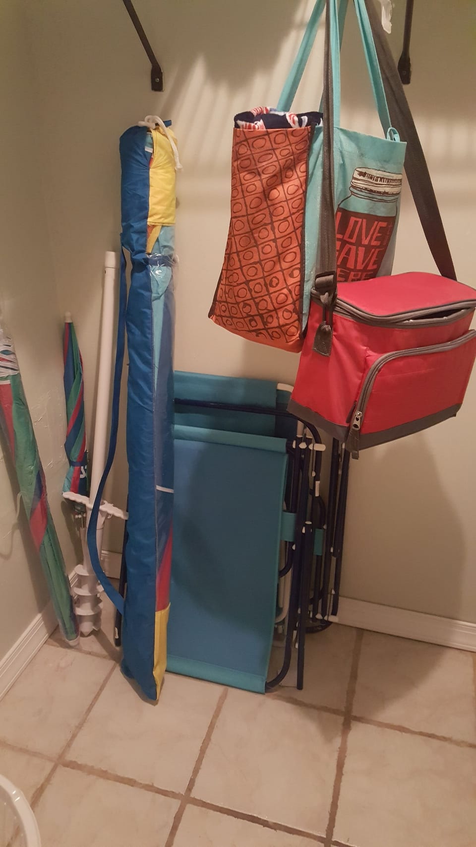 Beach Umbrellas, toys,towels, and coolers for your use, located in your closet. 