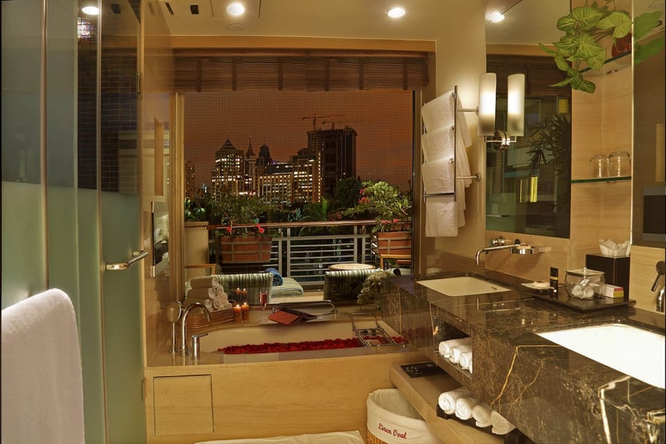 Luxury Suite, 1 Bedroom, Tower | Bathroom | Free toiletries, hair dryer, bathrobes, slippers