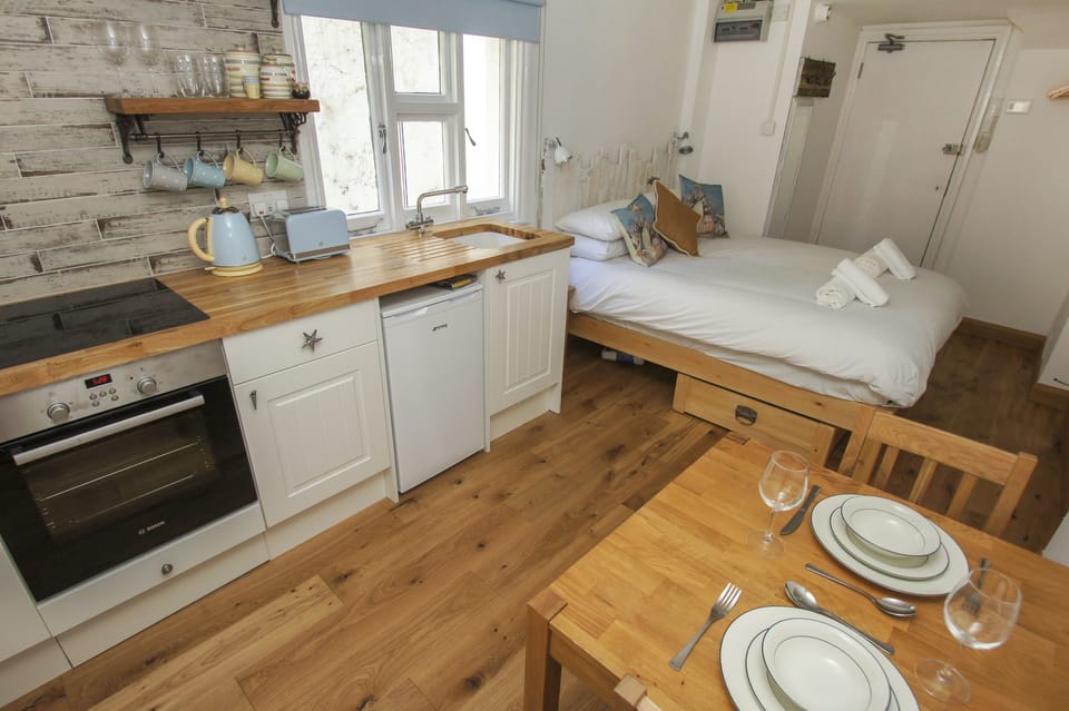 Brunswick Garden Studio Patio by Brighton Holiday Lets Cottage in Hove