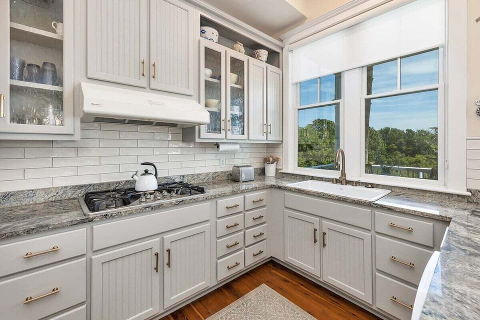 Kitchen with gray cabinetry