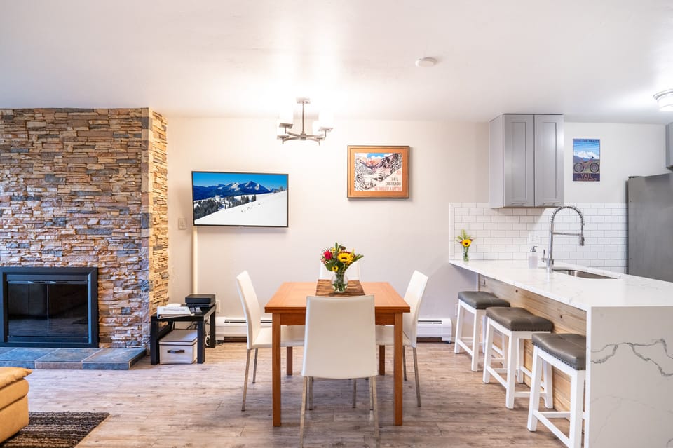 Kitchen table opens, with seating for four to six.