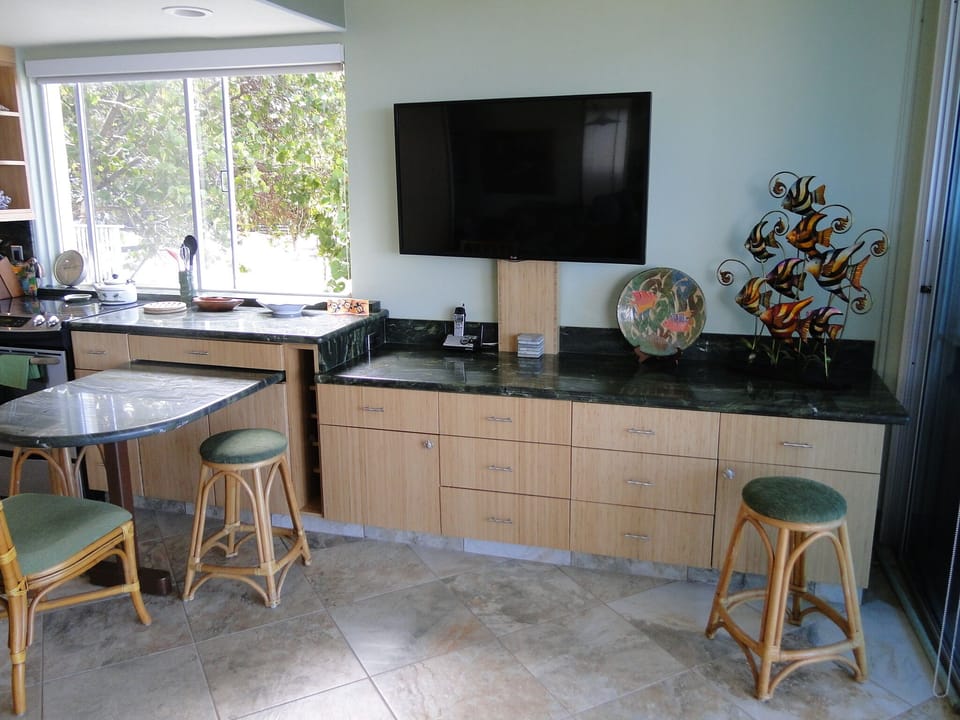 Entertainment center with HD service included on both TV's
