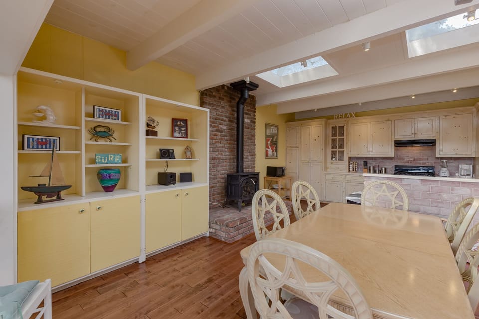 dining room with skylights