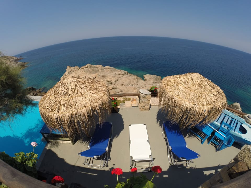 View of the Aegean sea and the second level courtyard.
