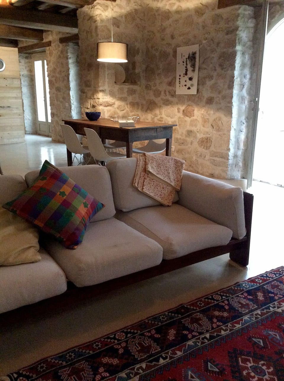The living area opens onto the garden
