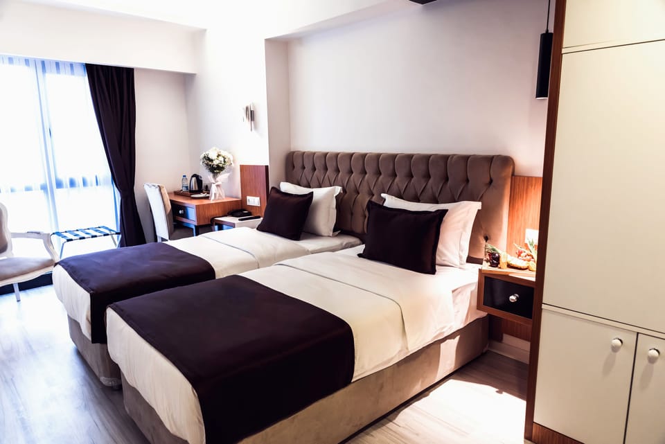 Premium bedding, memory foam beds, minibar, in-room safe
