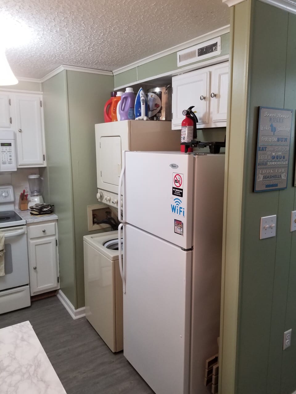 Kitchen w/Laundry and Refridgerater