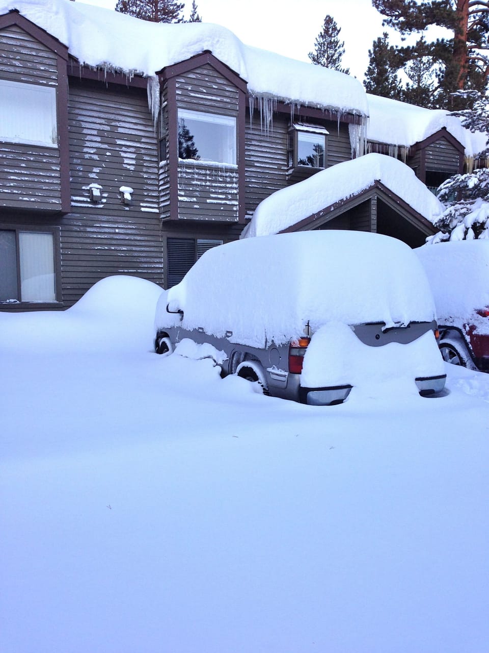 Front view of condo in winter of 2012. Typically parking is in front of unit.